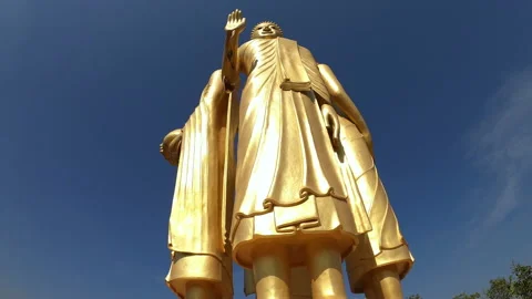 Motion Time lapse of The standing buddha statue with blue sky and clounds at Tem Stock Footage 166391376