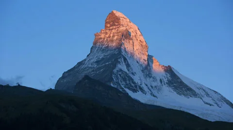 Motion time lapse sun rising Matterhorn, Zermatt Stock Footage 32327751