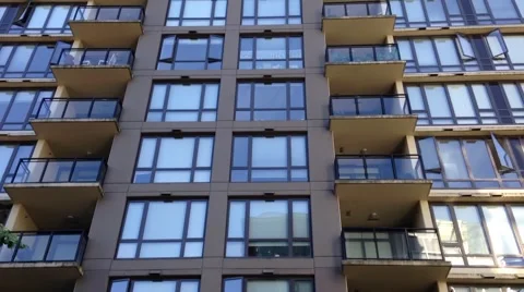 A motion time-lapse tilt up at a building Stock Footage 40050035