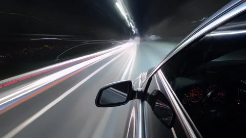 Motion timelapse of driving through night big city, view from car to the road Stock Footage 267818509