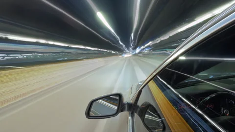 Motion timelapse of driving through night big city, view from car to the road Stock Footage 267819868