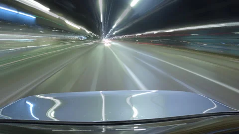 Motion timelapse of driving through night big city, view from car to the road Stock Footage 267967862