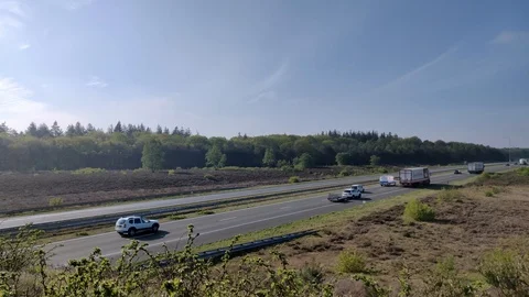Motion timelapse of Dutch highway a50 shot against sunlight Stock Footage 107366368