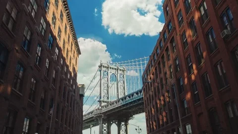 Motion timelapse: The famous Brooklyn Bridge, a popular tourist attraction in Stock Footage 77428416