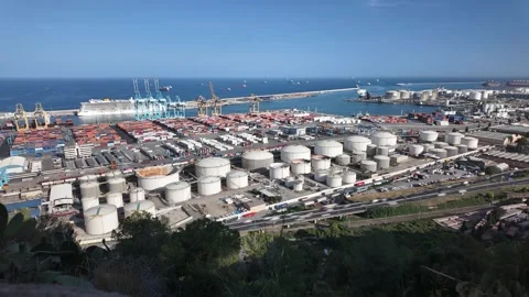 Motion timelapse of highway next to busy Barcelona port with a lot of cranes Stock-Footage 337985804