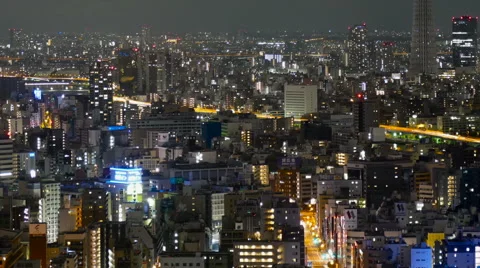 Motion timelapse of illuminated buildings and traffic over the highway Tokyo. Vídeos de archivo 65247828