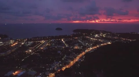 Motion Timelapse of Kata Beach and Traffic at Dusk With Colorful Sky Stock Footage 66337801