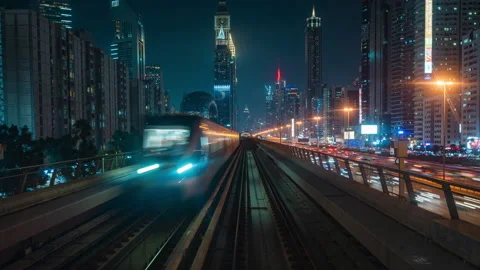 Motion Timelapse of Modern Dubai Elevated Rail Metro System at Night, Dubai, UAE Stock Footage 237092314