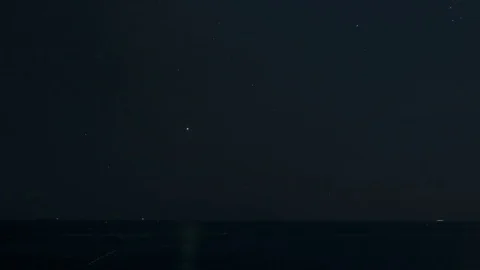 Motion timelapse from night to sunrise of the beautiful Qixingtan Beach Stock Footage