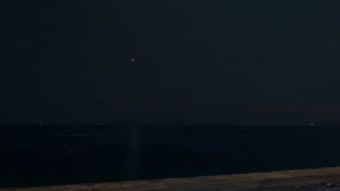 Motion timelapse from night to sunrise of the beautiful Qixingtan Beach Stock Footage