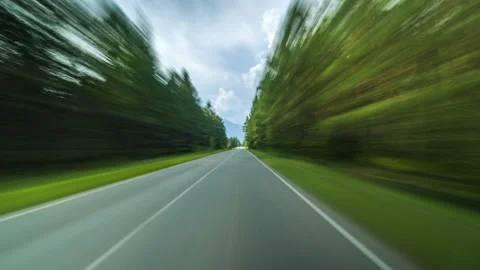 Motion Timelapse of a Speedy Day Drive. View From the Car Window to the Country Stock Footage 176868292