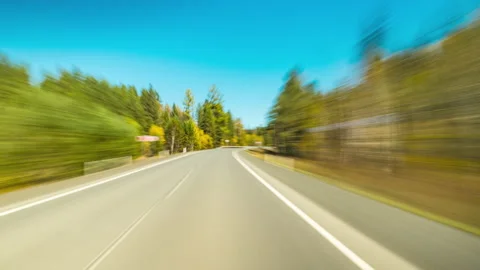 Motion Timelapse of a Speedy Day Drive. Hyperlapse Road Trip Stock Footage 213807127