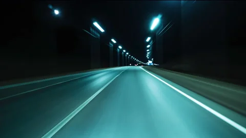 Motion timelapse of a speedy night drive near a big city. View from the car Stock Footage 170149308
