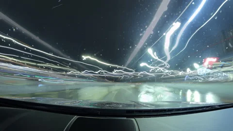 Motion timelapse of a speedy night drive in a big city. Front view from the car Video stock 267817866