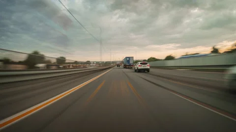 Motion timelapse of a speedy road drive along the countryside highway. Stock Footage 201500418
