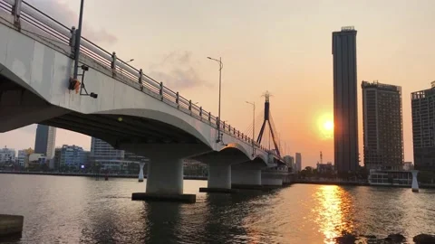 Motion timelapse of sunset at Han bridge, Da Nang city Video stock 151381463