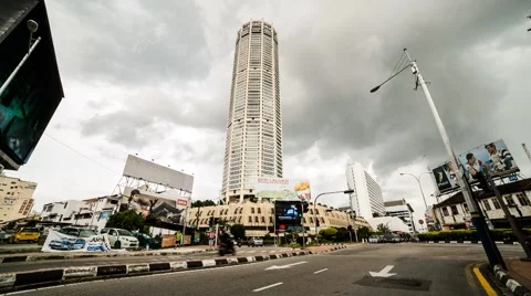 Motion Timelapse of Traffic in front of Komtar in Penang, Malaysia Stock Footage 49304287