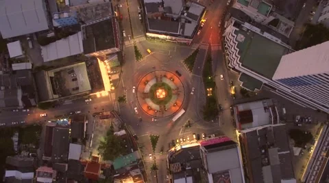 Motion Timelapse of Traffic on Roundabout at Dusk, Aerial View From Above Stock Footage 66379248