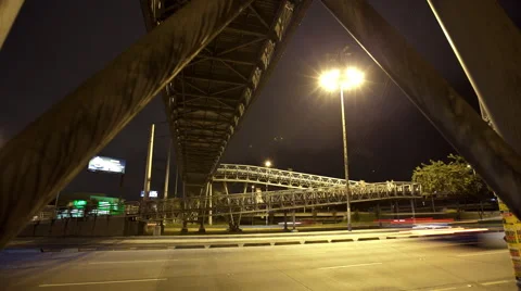 Motion timelapse under the pedestrian bridge of "El Virrey" Station Stock Footage 41895310