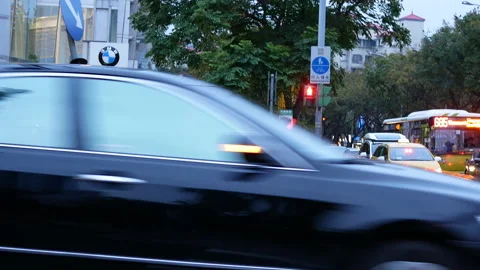Motion of traffic conductor directing the traffic during rush hour Stock Footage 90281100
