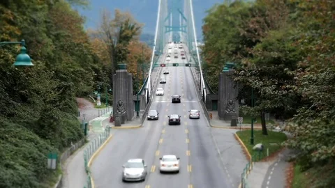 Motion of traffic flow on Lions Gate Bridge at Stanley Park Stock Footage 71574560