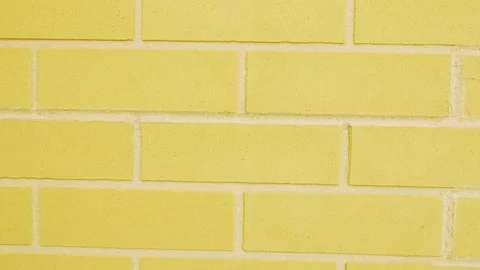 Motion upward yellow brick wall Vídeos de archivo 159294537