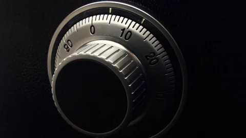 Motion video of the code selection in the iron lock of the safe. Stock-Footage 93434219