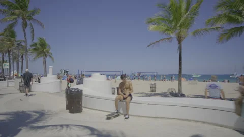 Motion video Spring Break on Fort Lauderdale Beach Florida. 4k gimbal stabi.. Stock Footage 331307675