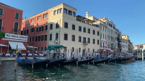 Motion view of gondolas parked at the waterfront. Venice, Italy Stock Footage 159368462