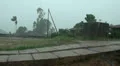 Motion view - Hard Rain in a small Jungle Village HD Footage