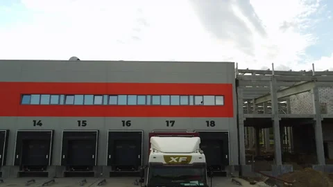 Motion view of long logistics park building development warehouse storage for Stock Footage 163255824