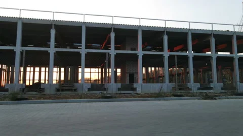 Motion view rows of large marble constructions at unfinished industrial building Stock Footage 163256814