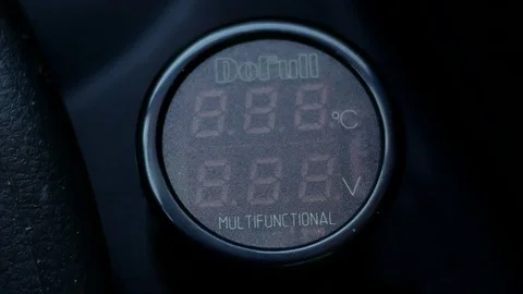 Motion of voltmeter voltage meter testing data while starting car engine Stock-Footage 79052201