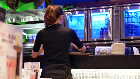 Motion of waitress serving drinks for customer inside Thailand restaurant Video stock 98322828