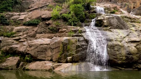 Motion of water stream is from mountain cliff - 4K, loop. Stock Footage 148277963