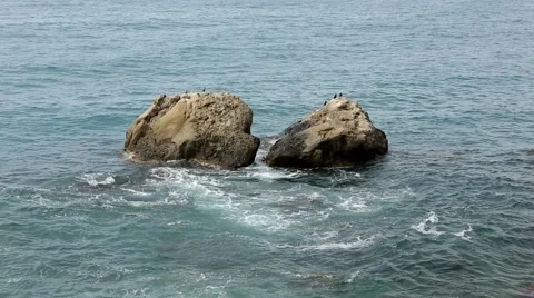 Motion of the waves on the beach. Mountain Meganom, Crimea, Russia.  Stock Footage 40276064