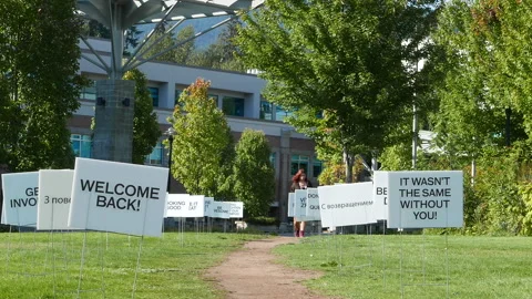 Motion of welcome sign on grass inside campus in Coquitlam BC Canada Video stock 94743333