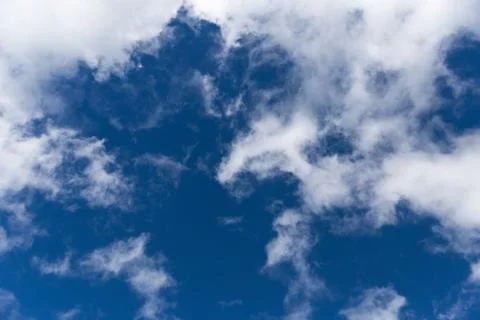Motion of white clouds on blue sky Foto stock