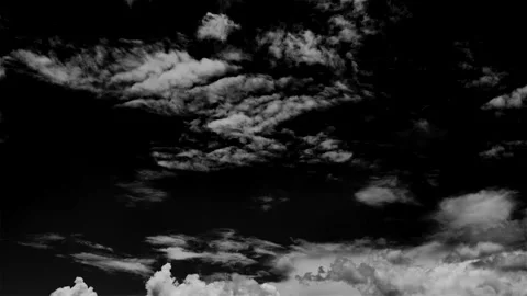 The motion of White Fluffy Clouds In black Sky Stock Footage 158237098
