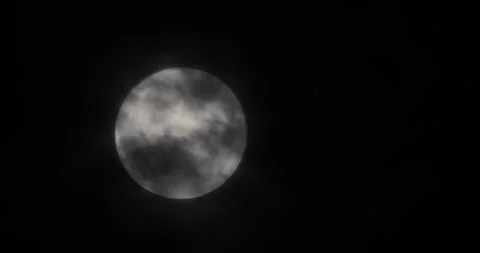 The motion of white full moon close up. The moon passing quickly through the str Video stock 168182151