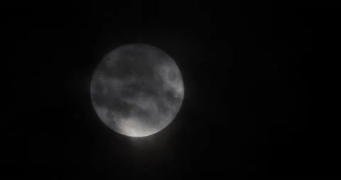The motion of white full moon close up. The moon passing quickly through the str Video stock 168182163