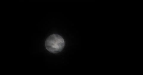 The motion of white full moon close up. The moon passing quickly through the str Video stock 168182175