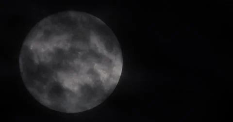 The motion of white full moon close up. The moon passing quickly through the str Video stock 168182192