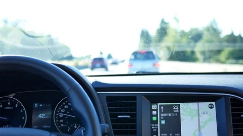 Motion of windscreen wipers cleaning windshield glass while car driving on road Stock Footage 79205598