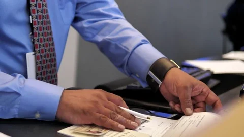 Motion of worker checking information about customer renting car Stockbeeldmateriaal 78456343