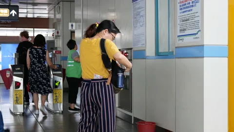 Motion of worker cleaning floor and wall inside MRT station with 4k resolution Video stock 97565480
