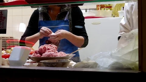 Motion of worker making steamed buns inside mall Stock Footage 72612280