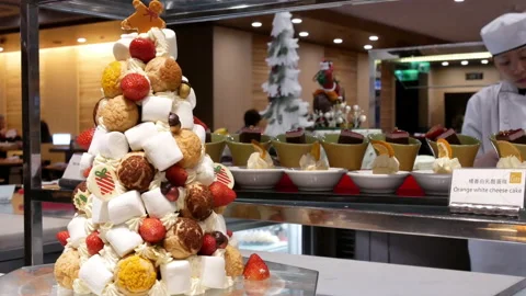 Motion of worker preparing food for customer at dessert area Stock Footage 100580222