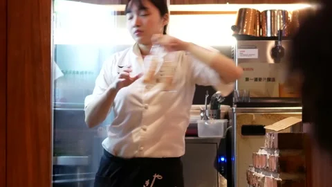 Motion of worker stocking drink and putting inside fridge Stock Footage 96828432