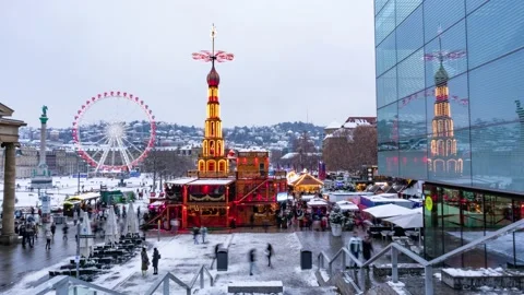 Motionlapse in Stuttgart, Germany, view of snowy crowded Christmas Market Stock Footage 227667150